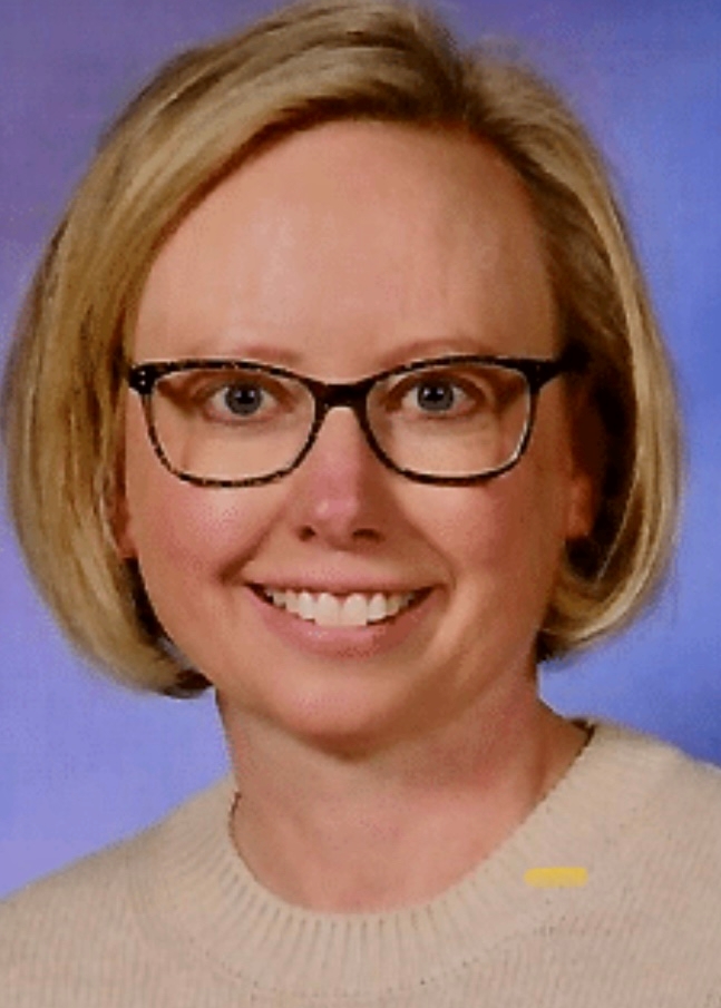 Heather McKay, author of Positively Prepared, smiling in glasses